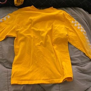Yellow Vans shirt with checkers down the sleeves